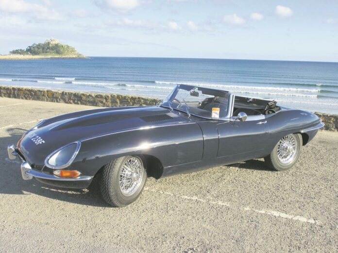 The gorgeous E-Type with St Michael's Mount in the background.