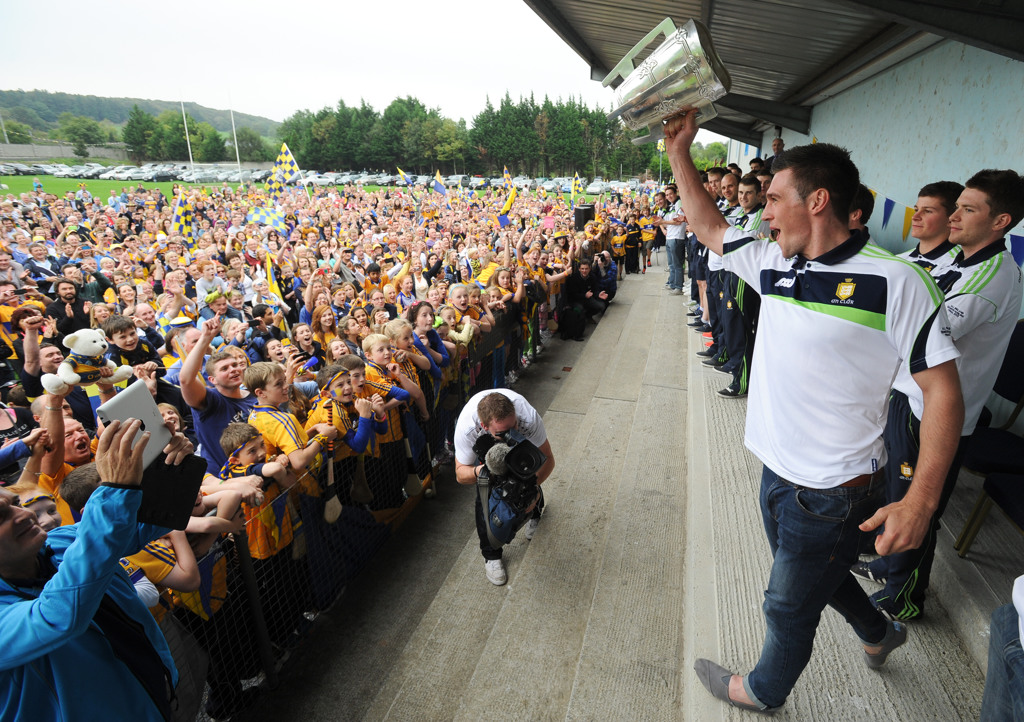 Conor Ryan lifts the Liam Mac Carthy during the Clare U-21 and Senior All-Ireland Champion hurlers homecoming at Cratloe GAA. Photograph by John Kelly