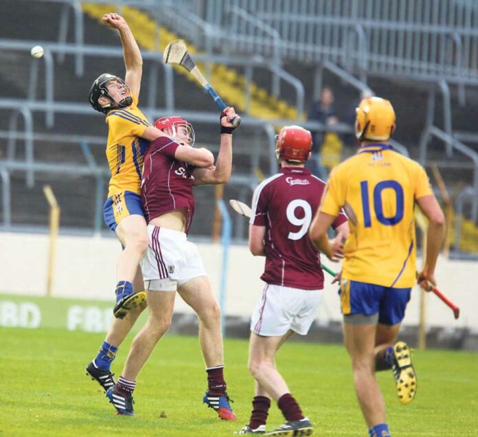 Clares Alan O'Neill battles with Galways Jonathan Glynn in The Under 21 Hurling Semi Final at Semple Stadium Thurles on saturday Evening.Pic Arthur Ellis.