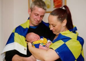 Mark and Laura Hinsley of Dun an Oir, Shannon with their newborn baby Shane, who they are naming after Clare hurling hero Shane O’Donnell.  Photograph by John Kelly