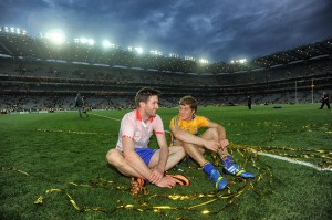 Darach Honan and Shane O'Donnell share a quiet moment on the Croke Park turf following the All-Ireland senior hurling final replay against Cork at Croke Park. Photograph by John Kelly.