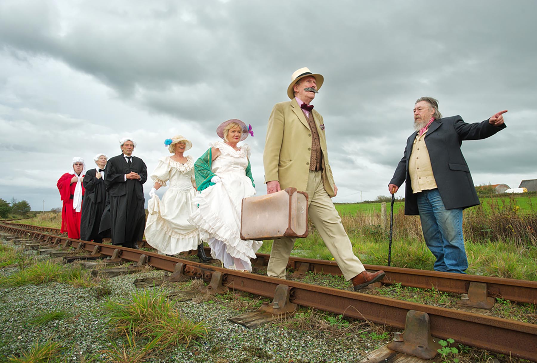 On the right track: Members of the Junk Shun Productions in their Laughter In Court costumes at a photocall in Moyasta Junction to promote the Kilkee Playwright Festival, which runs on November 1 and 2.  From front to rear;  Richard Gair, manager West Clare railway, as Mr Sullivan, Charles Clancy as Percy French, Theresa Hartigan and Margaret Whelan as Miss Malone A and Miss Malone B,  Paul Clegg as Clerk, Brian Comerford as QC Murphy, and Jim McNamara as Judge Kelly.  Photograph by John Kelly