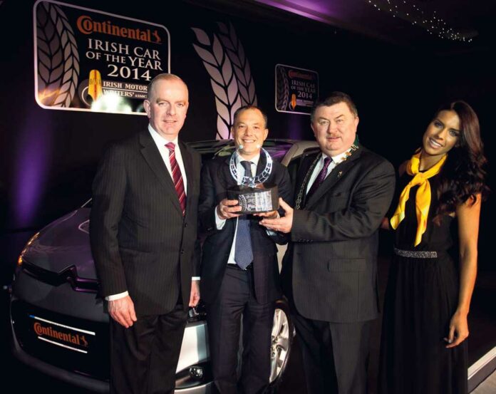 Pictured at the presentation of the Continental Irish Car of the Year trophy were Tom Dennigan, Continental Tyres Ireland, Frederic Soulier, Managing Director, Citroen Motors Ireland, Gerry Murphy, Chairman, IMWA and model Adrienne Murphy.