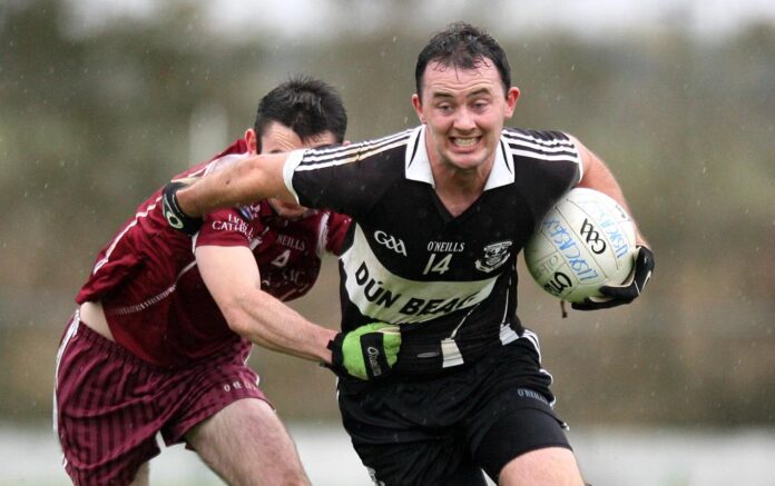 Doonbeg captain David Tubridy evades the challenge from Lissycaseys Martin O'Connor during their Senior Football Championship semi Final at Kilmihil on Saturday.Pic Arthur Ellis.