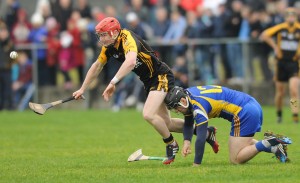 Paul Flanagan of Ballyea in action against Colin Ryan of Newmarket during their semi-final at Clarecastle. Photograph by John Kelly.