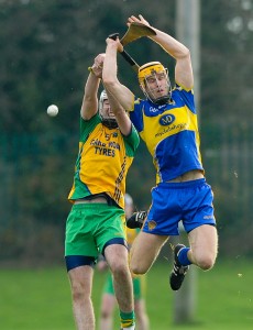 Chris O Looney of Inagh-Kilnamona in action against Shane O Brien of Newmarket during the Clare Champion Cup final at Clarecastle. photograph by John Kelly.