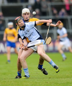 David Dempsey of Na Piarsaigh in action against John Fennessy of Sixmilebridge during the Munster Club Championship final at Cusack park. Photograph by John Kelly.