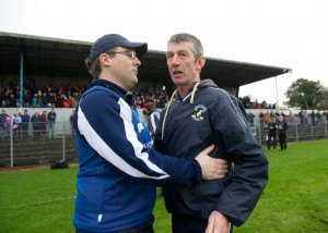 Na Piarsaigh manager and Sixmilebridge native Sean Stack is congratulated by Sixmilebridge manager John O Meara at the final whistle following the Munster Club Championship final at Cusack park. Photograph by John Kelly.