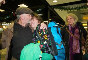 Gerry Broderick of Ennis greeting his daughter Sarah on her arrival home for Christmas from Maine, USA at Shannon Airport as her mother Liz sheds a tear of joy. Photograph by John Kelly.