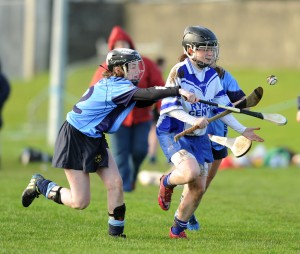 Corinna Mc Mahon of St Flannan's in action against Aoife Galvin of St Mary's Charleville during their Munster Senior A Colleges Camogie championship final at Newmarket. Photograph by John Kelly.