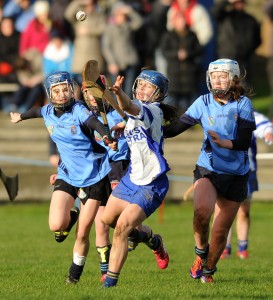 Aoife Keane of St Flannan's in action against Eimear O Gorman and Meadhbh Buckley of St Mary's Charleville during their Munster Senior A Colleges Camogie championship final at Newmarket. Photograph by John Kelly.