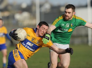 Cathal O'Connor tries to get past Leitrim's Shane Moran during their Round 2 Division 4 National Football League game at Miltown Malbay.