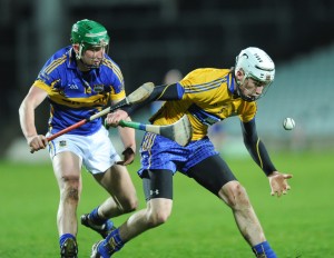 Conor Cleary of Clare in action against Conor Kenny of Tipperary during their Waterford Crystal Final at The Gaelic Grounds. Photograph by John Kelly.