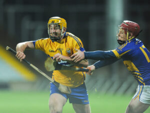 Cian Dillon of Clare in action against Kieran Morris of Tipperary during their Waterford Crystal Final at The Gaelic Grounds. Photograph by John Kelly.