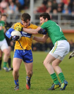 Sean Collins of Clare in action against Wayne McKeon of Leitrim during their Round 2 Division 4 national Football League game at Miltown Malbay. Photograph by John Kelly.