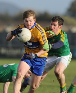 Podge Collins of Clare in action against Barry Prior of Leitrim during their Round 2 Division 4 national Football League game at Miltown Malbay. Photograph by John Kelly.