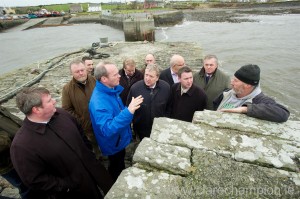 Minister Simon Coveney with local fishermen, elected representatives and election candidates at Doolin Pier. Photograph by John Kellly