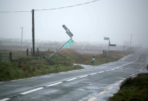 A signpost yields to the wind in West Clare. Photograph by Arthur Ellis