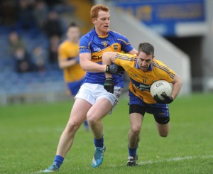 George Hannigan of Tipperary in action against Shane Mc Grath of Clare during the National League game at Thurles. Photograph by John Kelly.