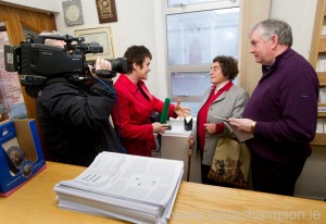 Maureen Cronin and Fr Tom Hogan being interviewed by Teresa Mannion, which Jim Wylde captures the moment. Photogaph by John Kelly 