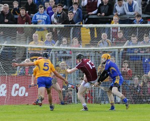 Brendan Bugler, Jack Browne (behind Brendan) and Patrick Kelly of Clare scupper the chances of Galway's Cathal Mannion during their NHL Division 1 Round 5 game at Cusack park, Ennis. Photograph by John Kelly.