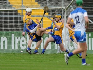 Jason Loughnane of Clare blocks a double attack at goal helped by Seamus Downey and Darragh Walsh during their Munster Minor hurling Championship game against Waterford at Cusack park. Photograph by John Kelly.