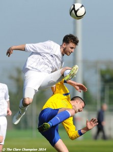 Conor Dillon of AUL Dublin in action against Stephen Kelly of Clare League during the Oscar Traynor Trophy Final at AUL Complex, Clonshaugh, Dublin. Photograph by John Kelly.