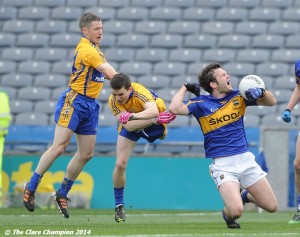 Martin Oige Murphy and Martin Mc Mahon of Clare in action against Barry Grogan of Tipperary during the Division 4 League final in Croke Park. Photograph by John Kelly.