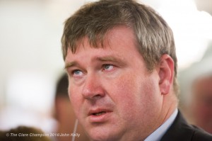 An emotional Senator Martin Conway listening to an interview on radio by Fine Gael's Bill Slattery after the latter was  elected during the election count at The West county Hotel, Ennis. Photograph by John Kelly.