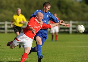 Alan Brigdale of Newmarket Celtic A in action against Ethan Considine of Ennis Town A during the Clare Cup final at the County Grounds. Photograph by John Kelly.