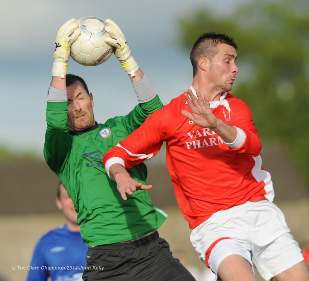 Stephan Loftus of Ennis Town A in action against Steven Kelly of Newmarket Celtic A during the Clare Cup final at the County Grounds. Photograph by John Kelly.