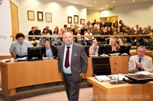 John Crowe stands to applause following his election as the new Mayor of Clare. Photograph by Declan Monaghan