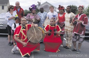 Podge Colliins gets into the spirit of the event with local Moroccan musicians.