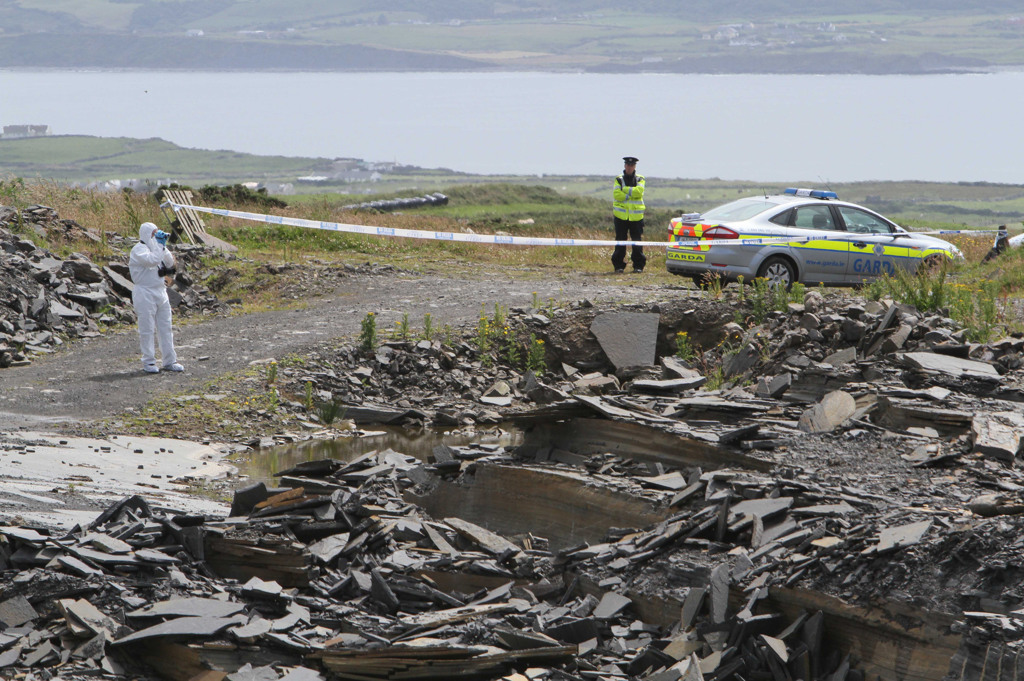 Garda at the scene  where a body was found in a quarry  near the Cliffs of Moher. 