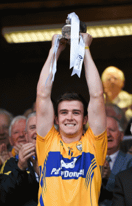 Clare captain Tony Kelly lifts the cup following their victory over Cork. Photograph Stephen McCarthy / SPORTSFILE 