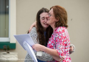 Susie Fogarty, a pupil of Gaelcholaiste an Chlair, has tears of joy as she embraces her mother Bridget while collecting her Leaving cert  results on Wednesday morning. Photograph by John Kelly.