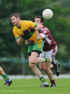 Damian Clohessy of O Curry's in action against Christy O Brien of Doora Barefield during their game in Kilmihil. Photograph by John Kelly.