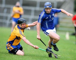 Cratloe's Podge Collins battles with Sixmilebridges Tadgh Keogh during their Senior Hurling Championship game at Cusack Park Ennis on saturday.