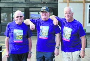 Pat Lynch, Gerry Mc Mahon and Kevin O Loughlin about to catch the bus for the Weightwatchers/Clare Champion Liscannor to Cliffs of Moher coastal walk. Photograph by John Kelly.