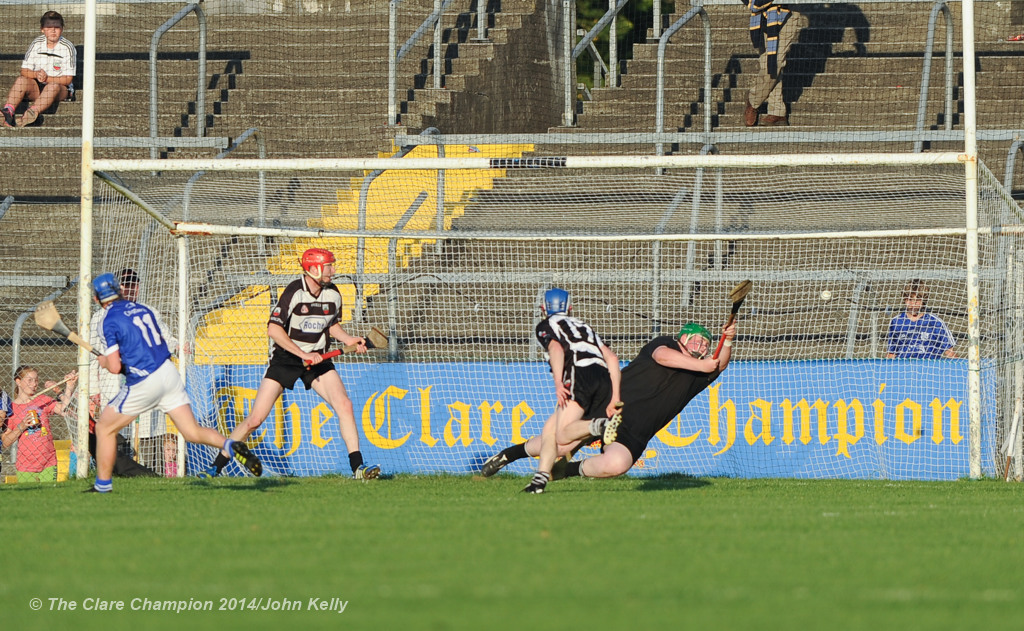 Jamie Coughlan of Clarecastle fails to block the goal effort from Podge Collins of Cratloe during their semi-final at Cusack Park. Photograph by John Kelly.