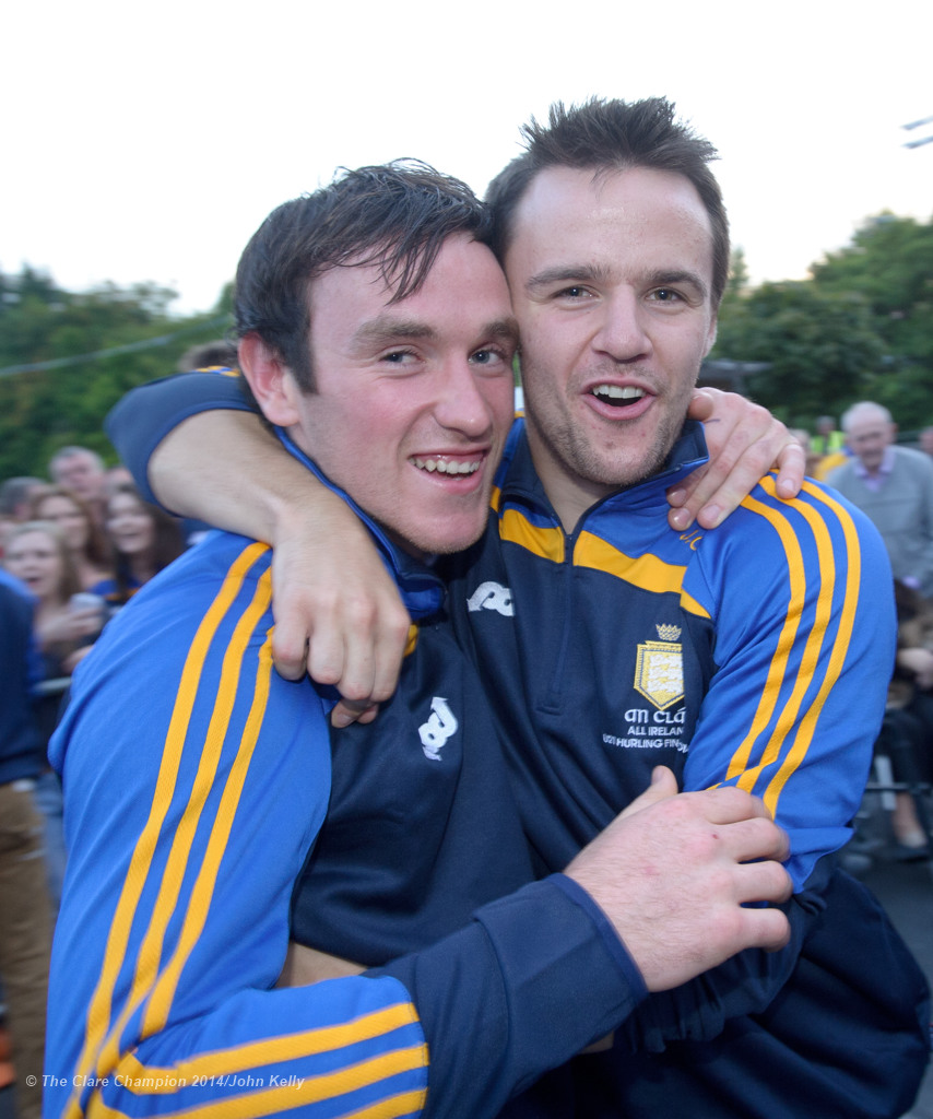 Players Gearoid O Connell and Jarlath Colleran celebrate at the homecoming ceremony for the Clare U-21 All-Ireland champions in Ennis. Photograph by John Kelly.