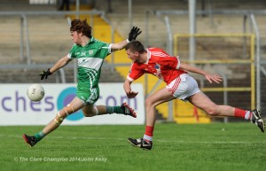 Wolfe Tones Darragh Leahy scores a goal despite Corofin's Eoin Clancy during their Intermediate final in Cusack park. Photograph by John Kelly.