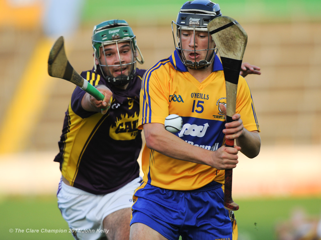 David Reidy of Clare in action against Conor Devitt of Wexford during the All-Ireland U-21 final in Semple Stadium, Thurles. Photograph by John Kelly.