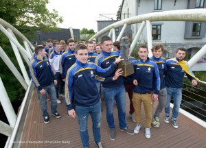 The team arrives with the Cross Of Cashel Trophy for the homecoming ceremony for the Clare U-21 All-Ireland champions in Ennis. Photograph by John Kelly.