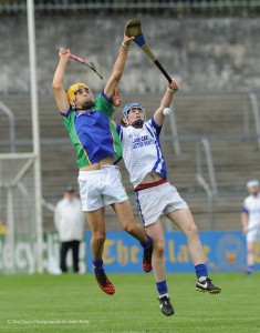 Sean Malone of Kilmaley in action against Tobias O Meara of Feakle/Killanena during their Minor A county final at Cusack Park Photograph by John Kelly.