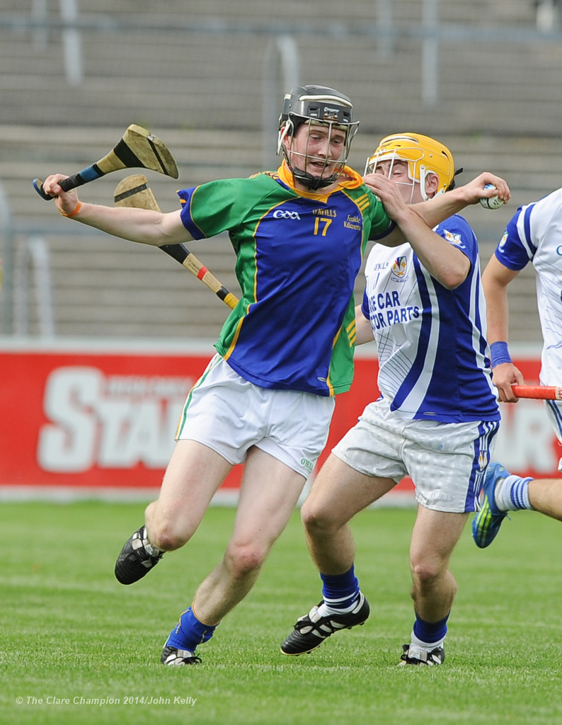 Dara Mc Namara of Feakle/Killanena in action against Sean Malone of Kilmaley during their Minor A county final at Cusack Park Photograph by John Kelly.