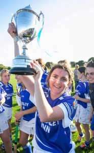  Kilmaley captain, Claire McMahon celebrates with the cup. Photograph by Arthur Ellis.