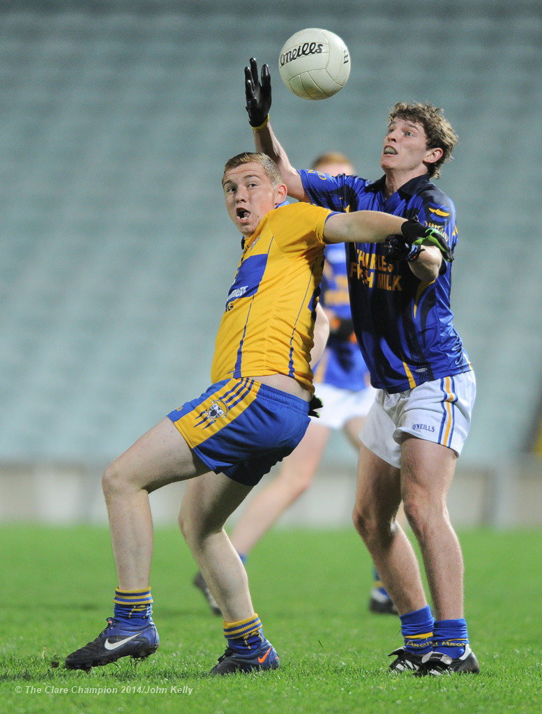 Nigel Murray of Clare in action against Jack Kennedy of Tipperary during their U-17 Munster League final in The Gaelic Grounds. Photograph by John Kelly.