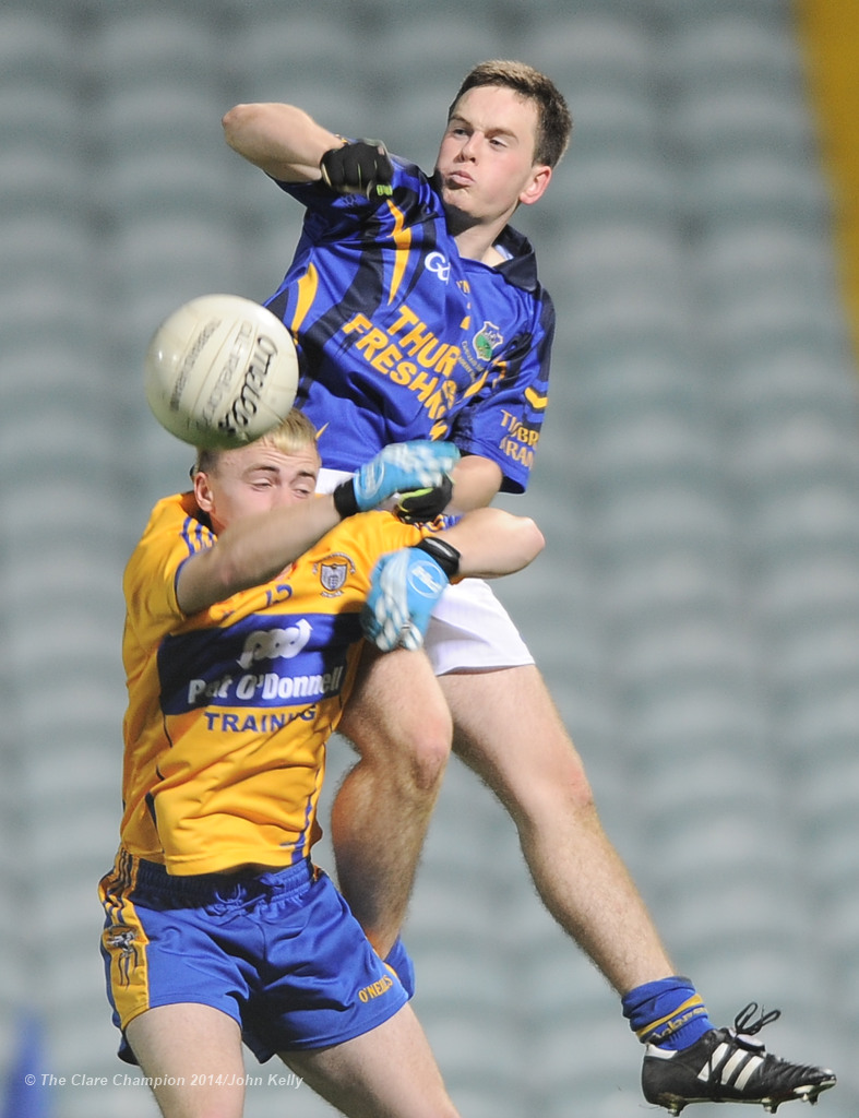 Sean Malone of Clare in action against Tommy Lowry of Tipperary during their U-17 Munster League final in The Gaelic Grounds. Photograph by John Kelly.