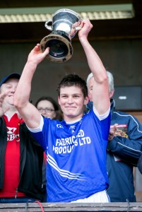  Cratloe captain Liam markham lifts the Canon Hamilton Cup after victory over Crusheen in the County Final.Pic Arthur Ellis.